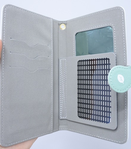 タヌキとキツネ スマホケース 挟まったタヌキ 中身